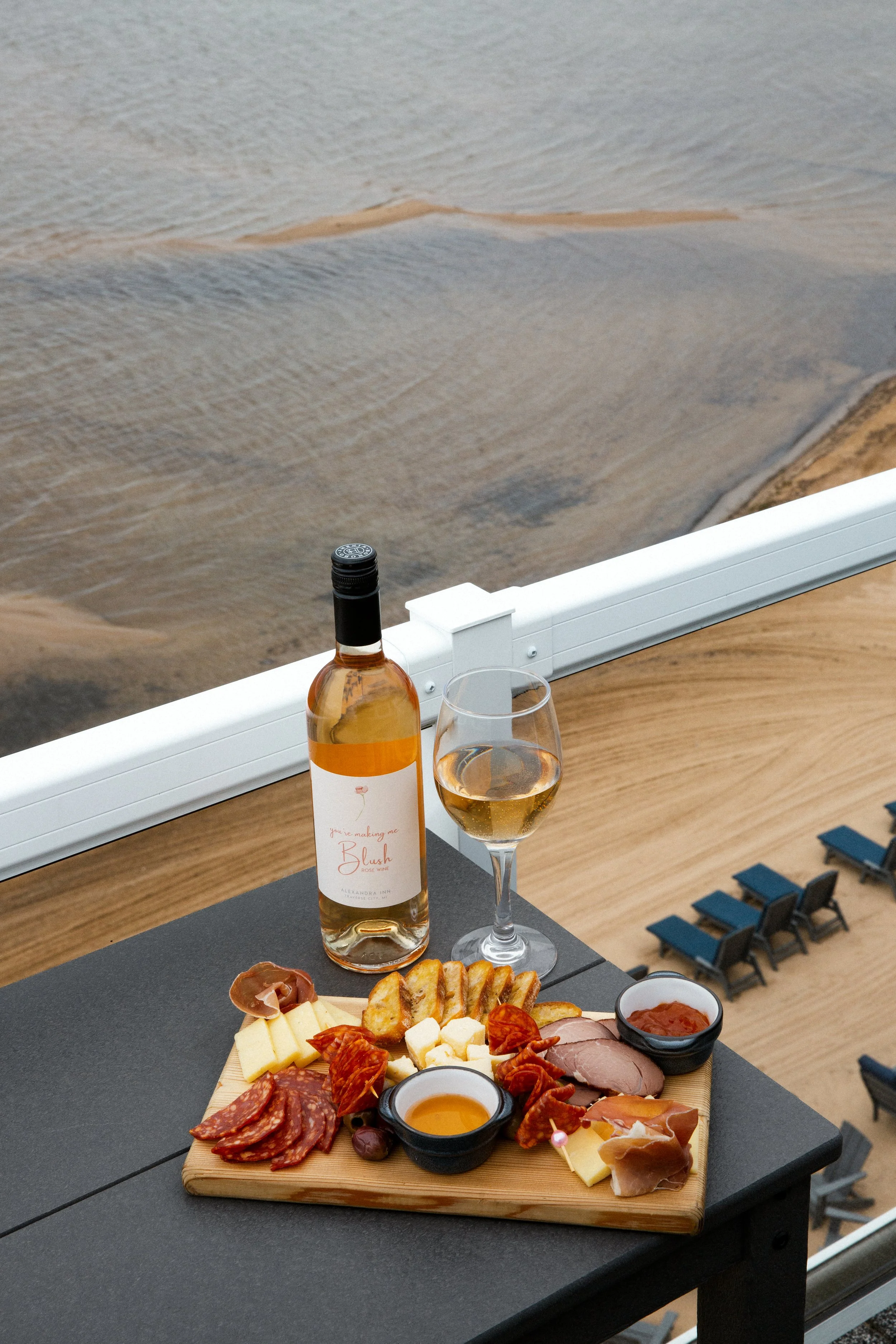 Charcuterie board and local wine at Traverse City waterfront bar