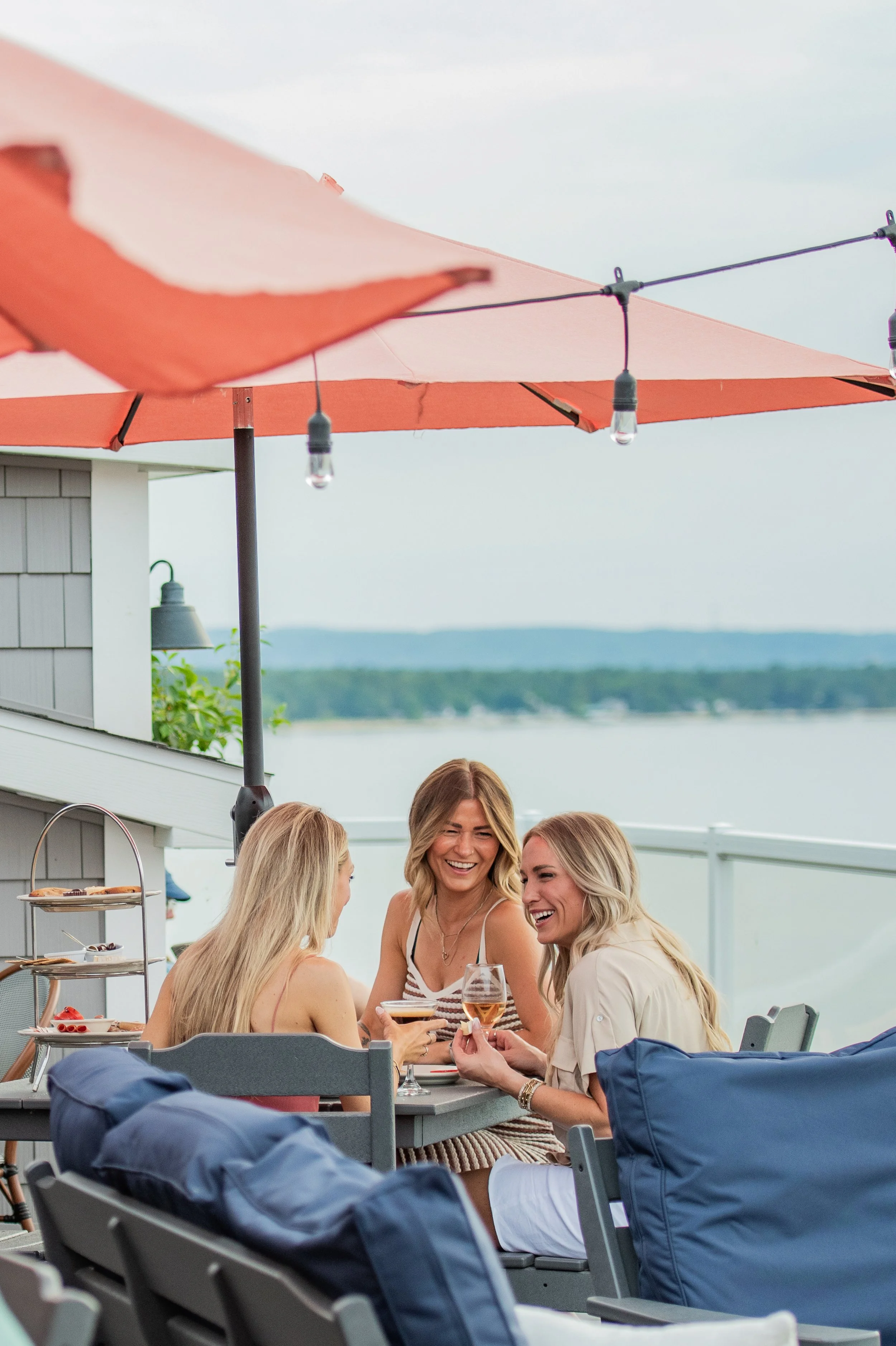 Young women enjoying local wine at Blush Rooftop Terrace at Alexandra Inn