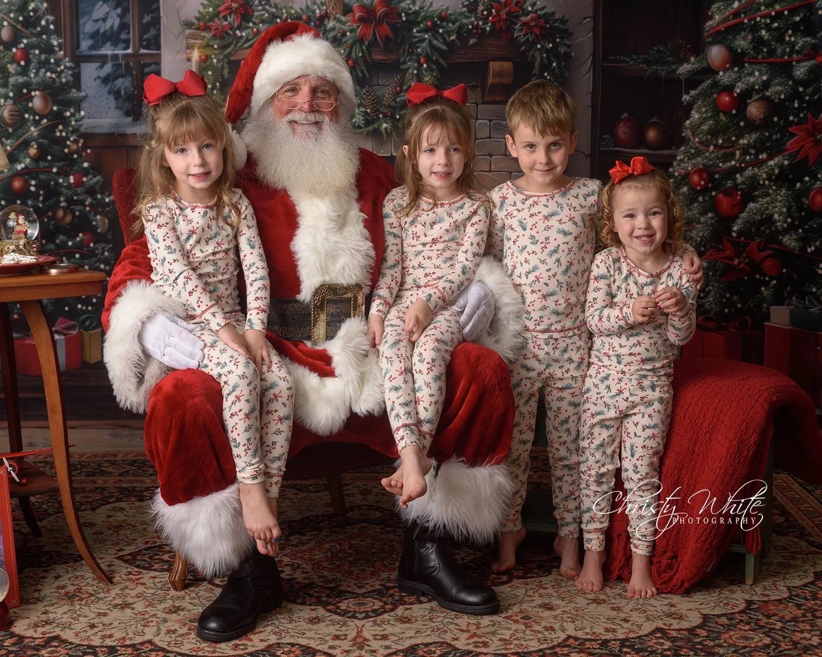 Child visiting Santa during a Christmas photography session near Alvin Texas