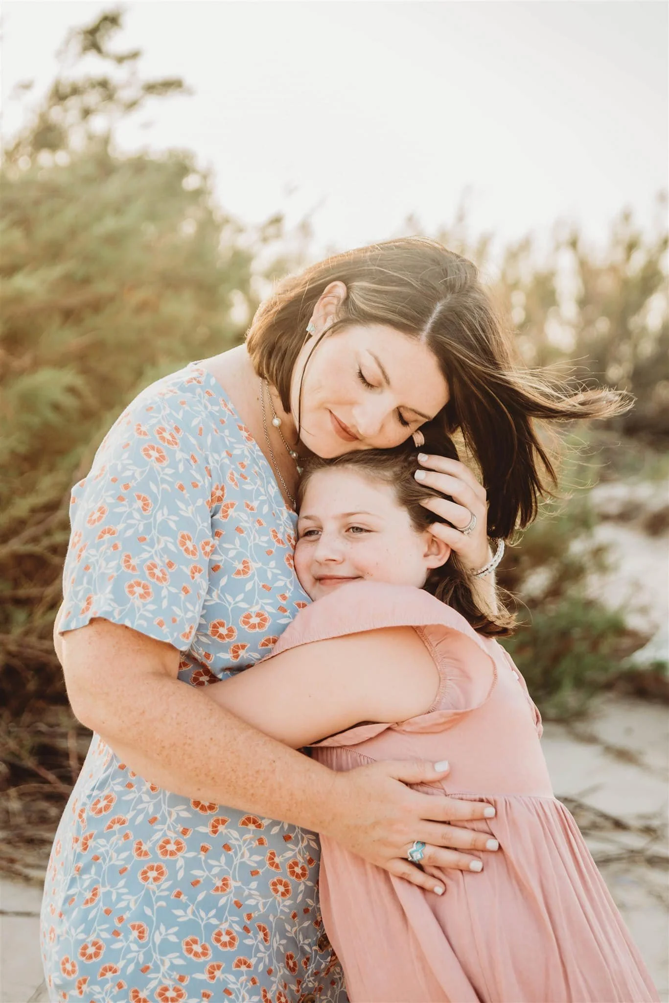 mother and daughter sharing a meaningful moment on a Texas Gulf Coast Beach