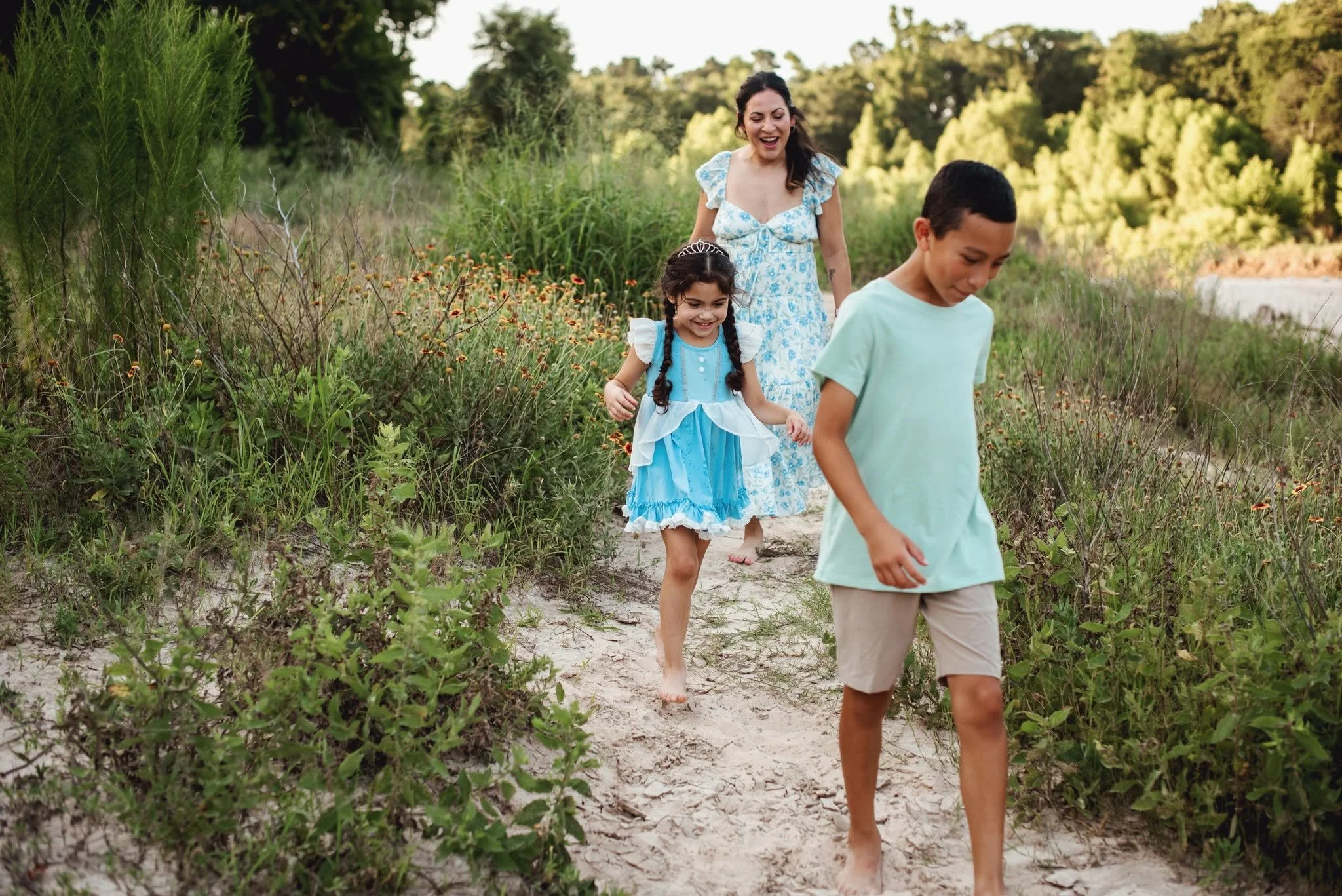 Brother and sister enjoying a summer evening together during a family photography session at Pundt Park.