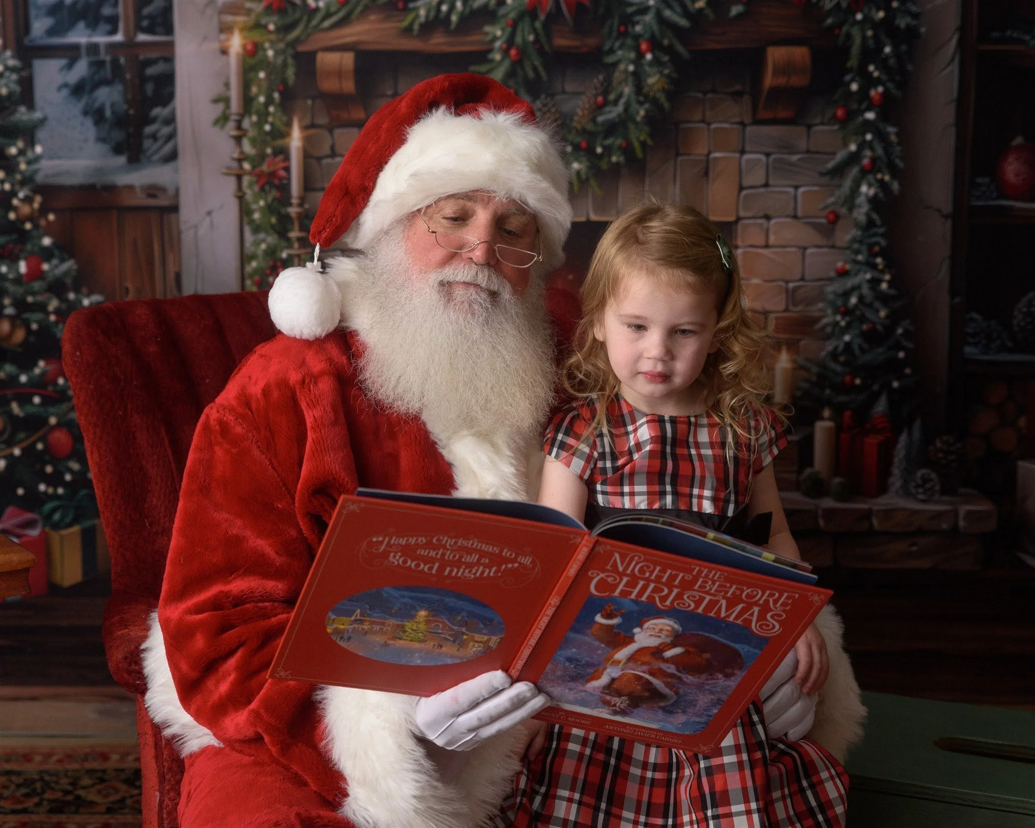 Child helping Santa solve a Christmas mystery inside Santa's Study in Alvin.