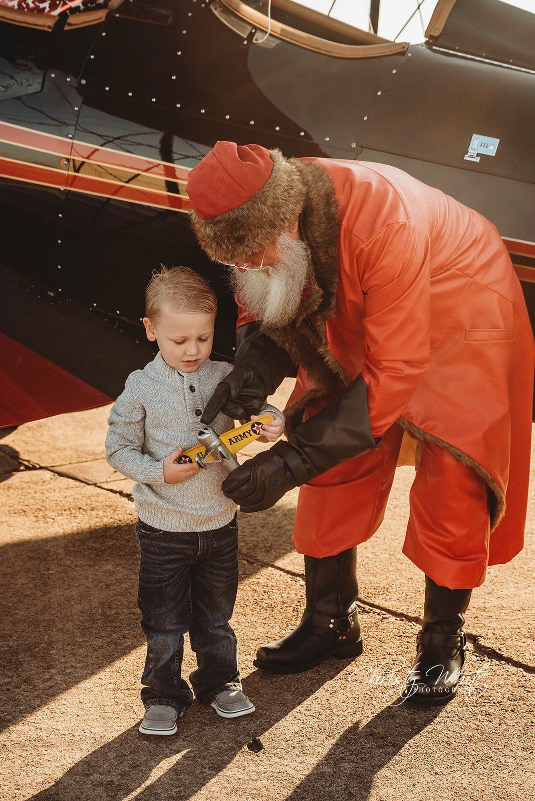 Santa helping children create magical Christmas memories in Galveston.