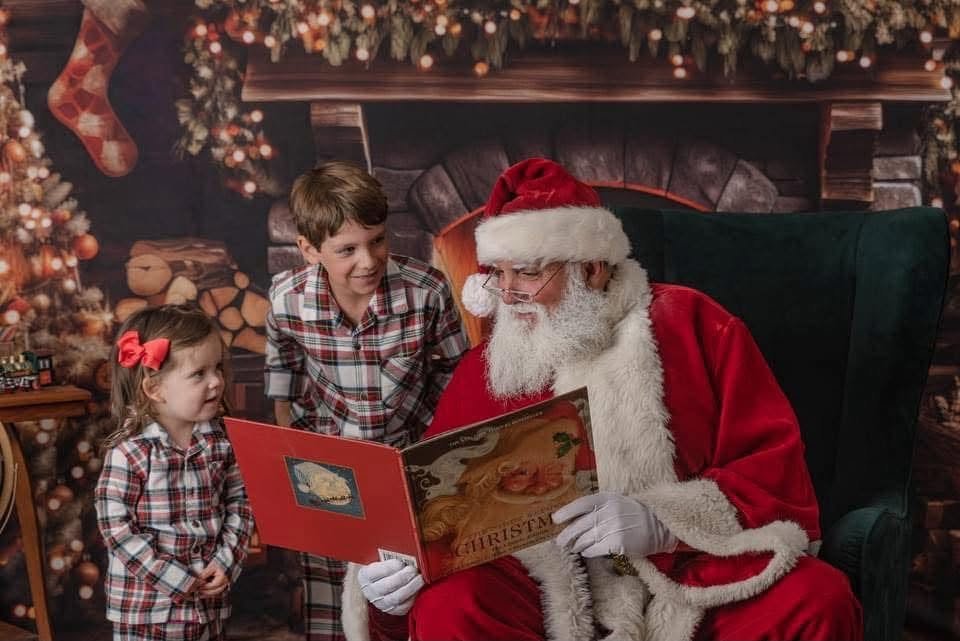 Child photographed with Santa during a Christmas session near Friendswood Texas