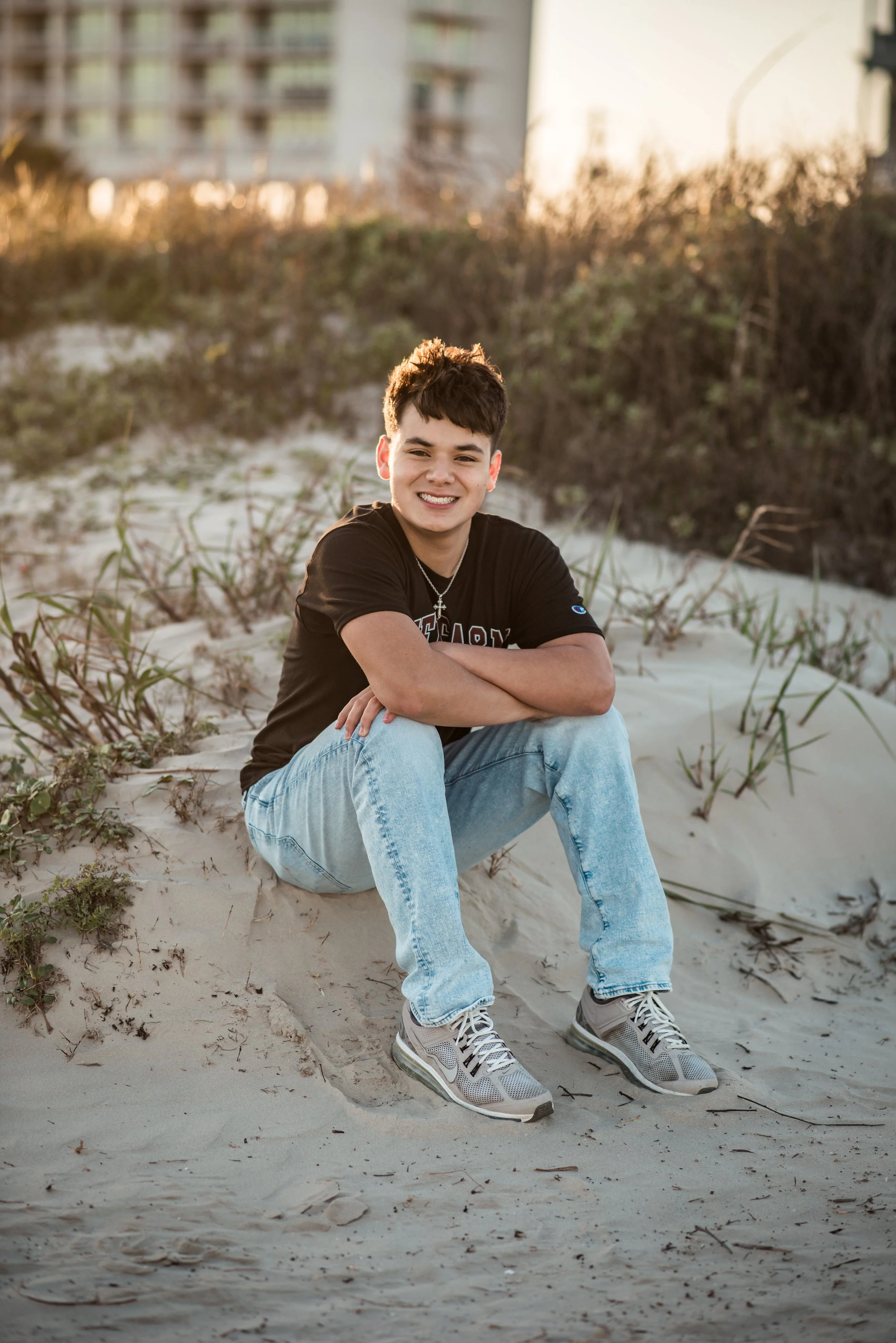 A Pearland High School senior session on a Galveston Beach during golden hour