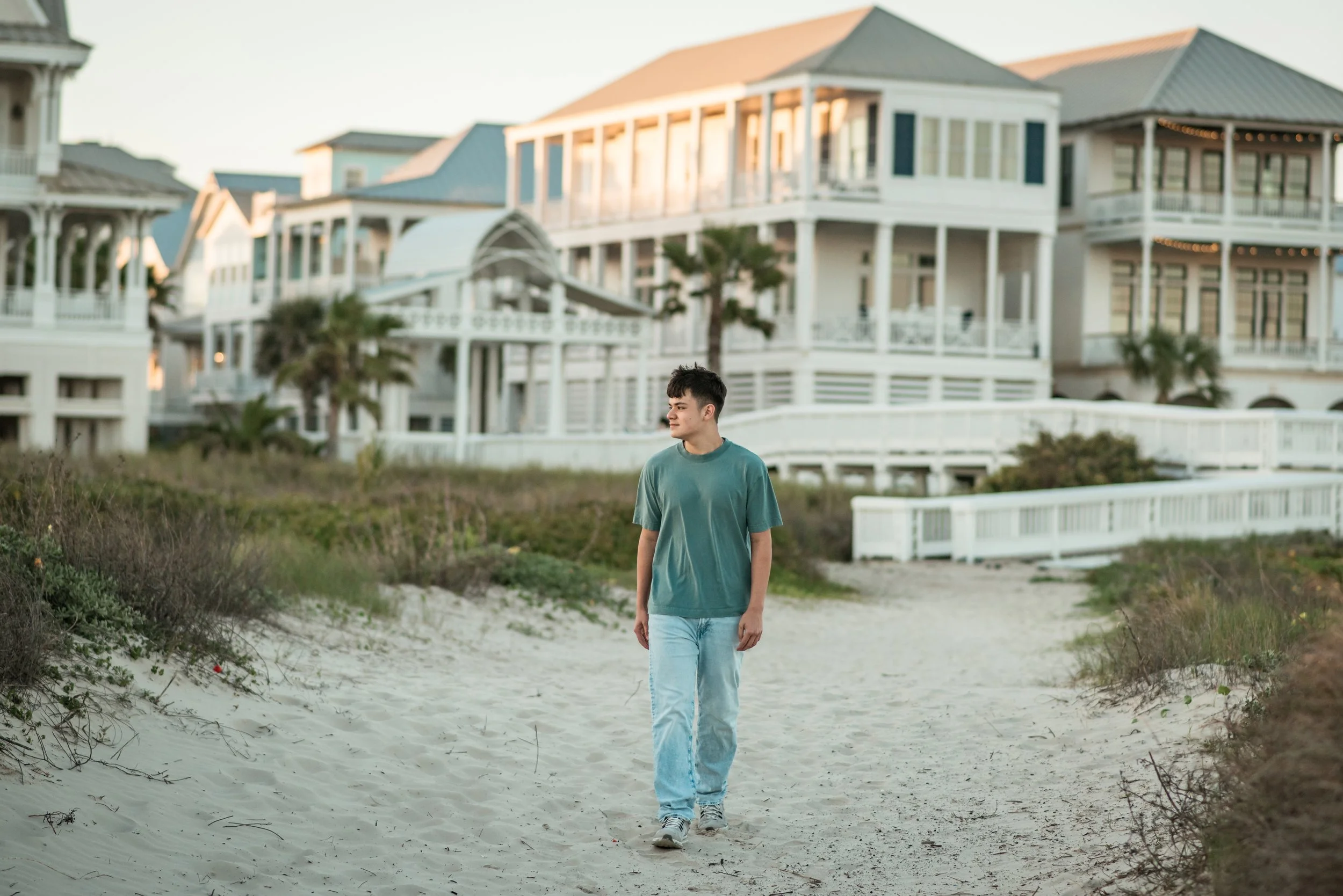 A golden hour senior session on Galveston Beach