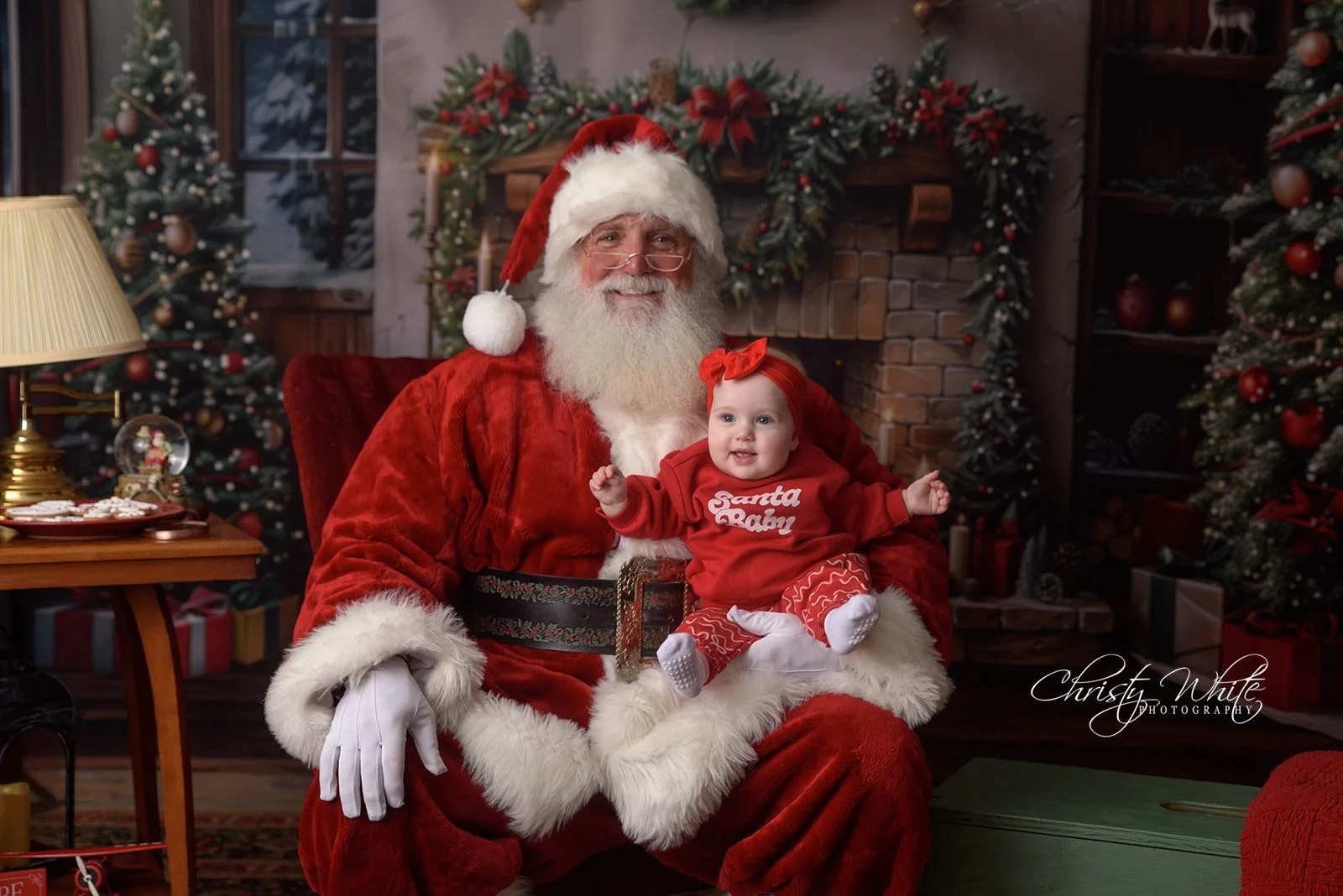 Child sharing a Christmas moment with Santa during a Santa photography session near Pearland Texas