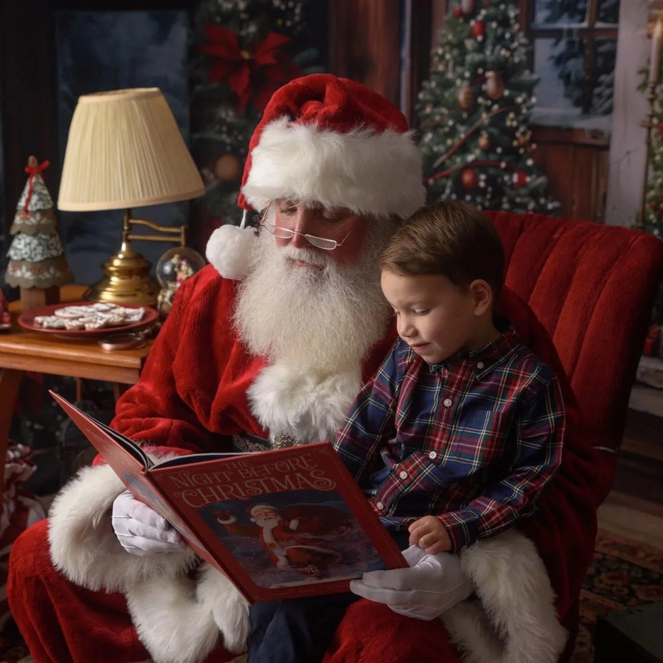 Santa reading a Christmas story to children during a magical Santa session.