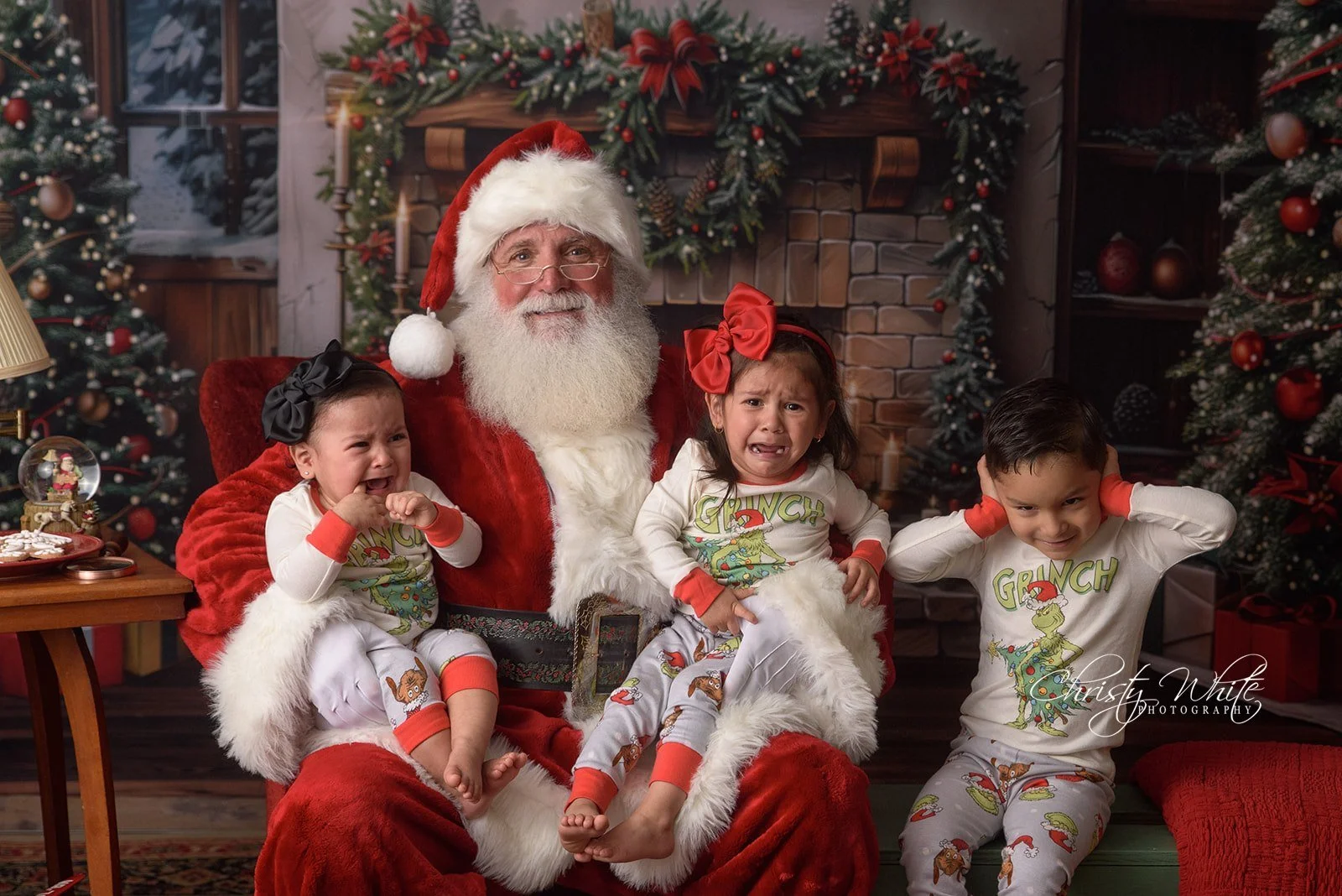 Child talking with Santa during an interactive Christmas photography session