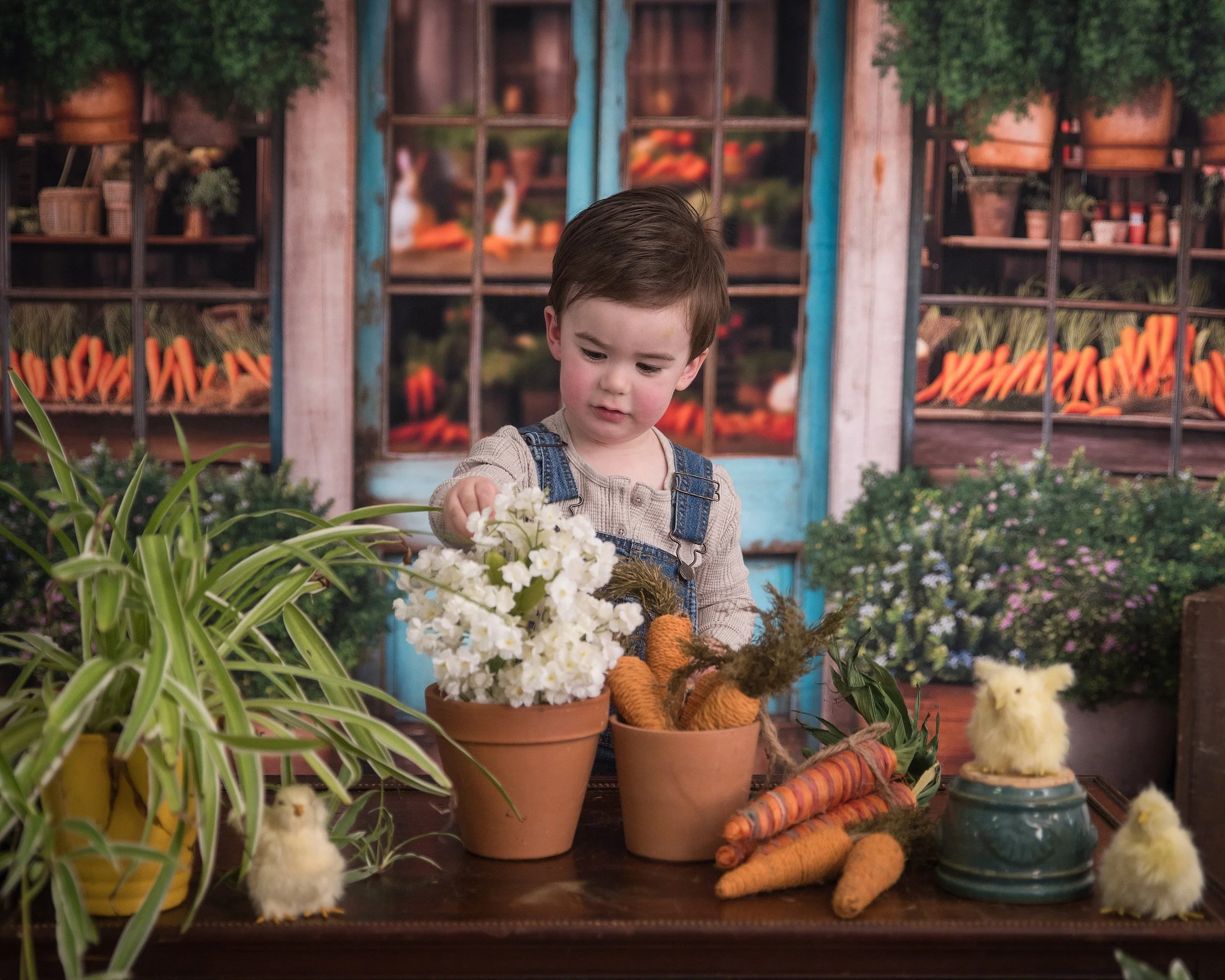 Child engaged naturally during limited edition seasonal photography session in Friendswood Texas