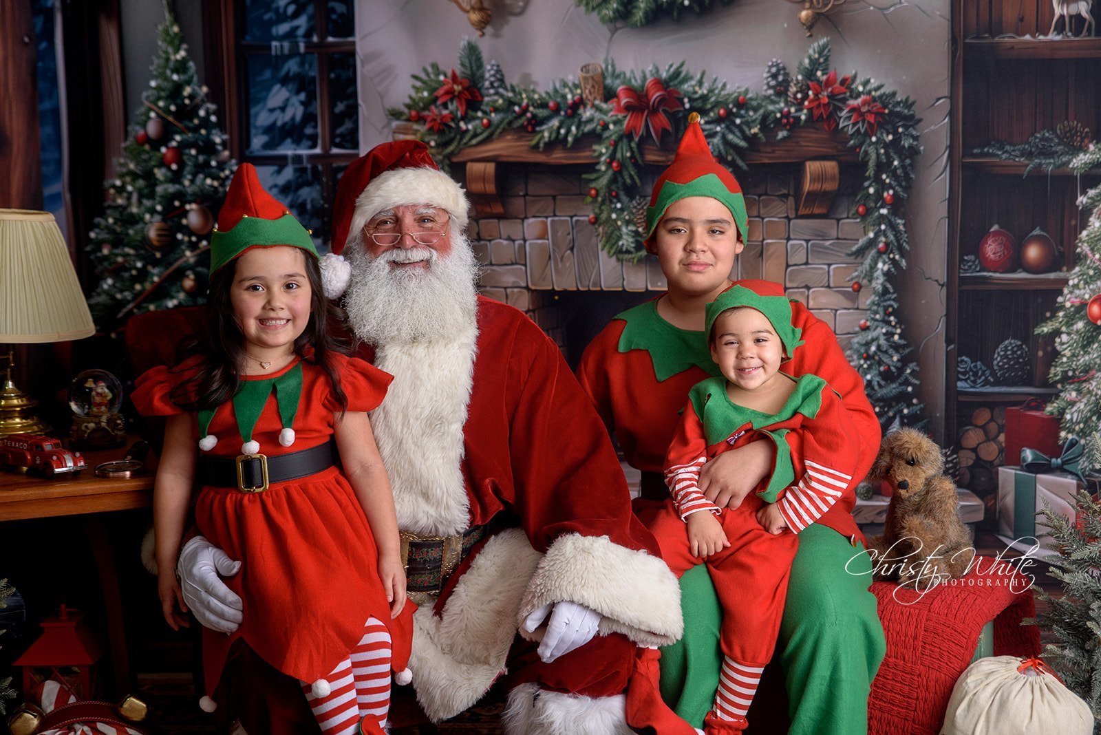 Child enjoying an interactive Santa photography session in the Houston Bay Area