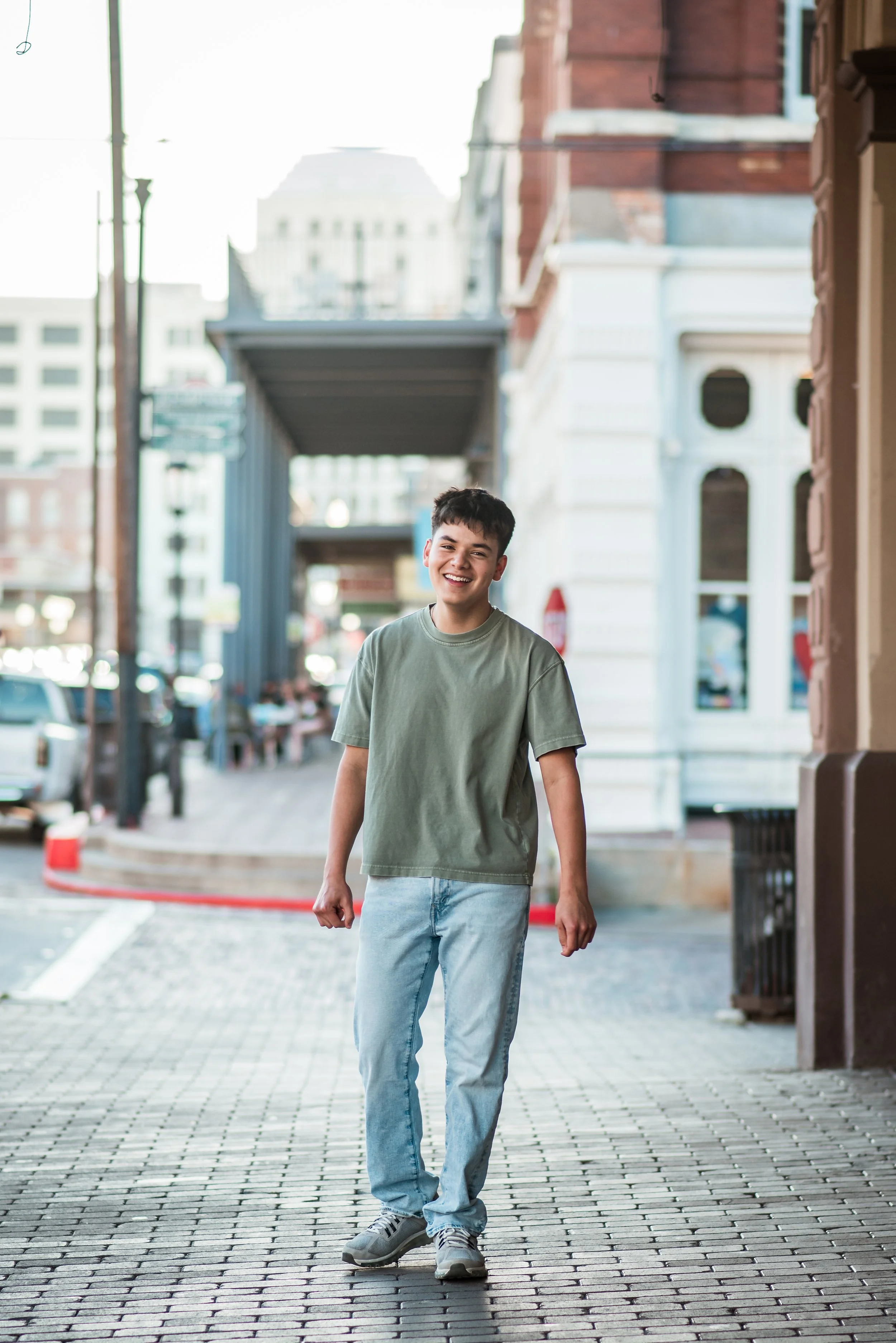 A fun and energetic high school senior session in the historic Galveston Strand area