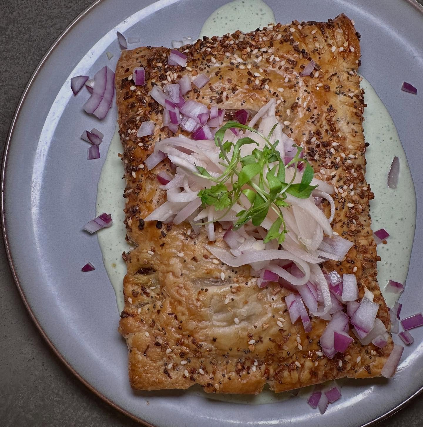 Special Addition for Saturday 11/8! ✨ 

🌮 Birria Hot Pocket
Slow-cooked beef in a Mexican-inspired broth with smoked gouda, baked inside a puff pastry shell. Garnished with cumin-pickled kohlrabi, red onion, and lime-cilantro crema. Served with cons