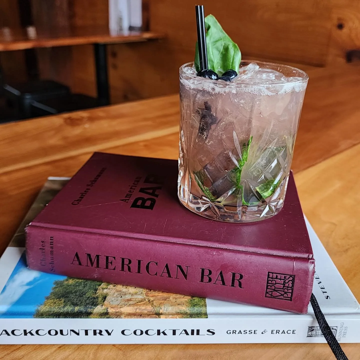 Weekend Cocktail Special: Berry &amp; Barrel Smash 🫐 🌿 🥃 

Juicy blueberries, fresh basil, a touch of citrus, and @bullyboybooze bourbon - if the flavors don&rsquo;t transport you to sunshiney days, the bourbon will warm you right up!