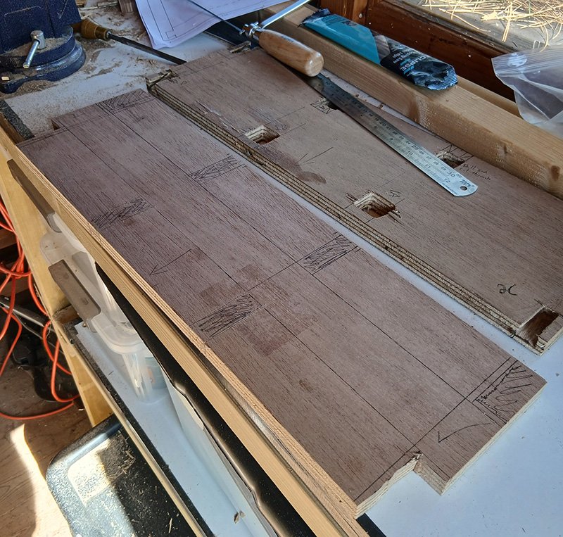 wooden panel in the process of being cut