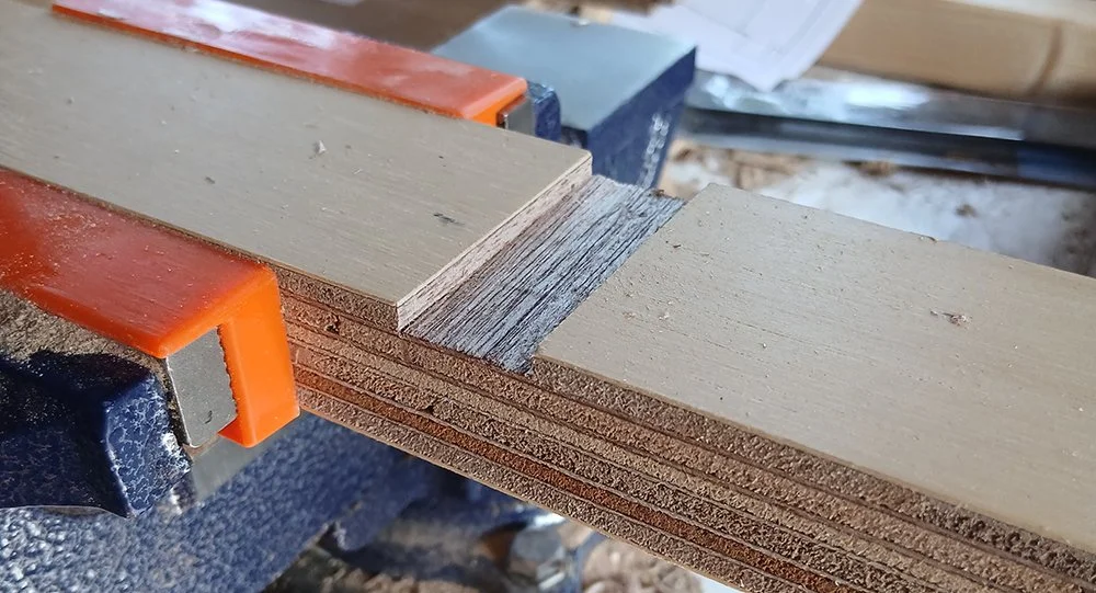 A small slot has been cut out of the wood for another piece to slot into.