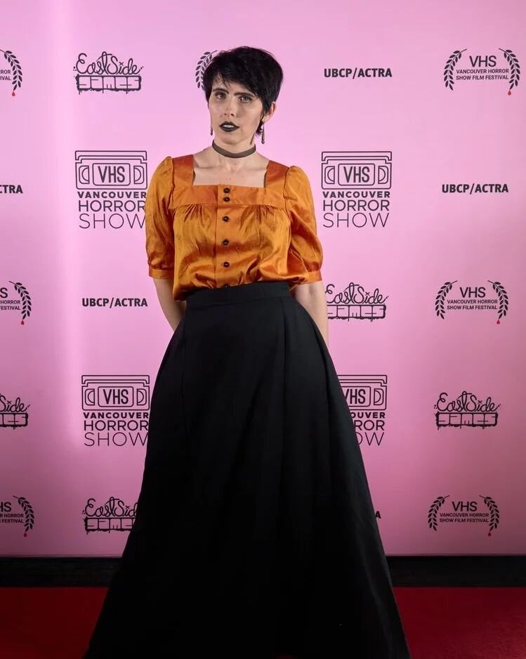 Oh hey, look! It's some more red carpet fun from @vancouverhorrorshow during the Sunday screenings (which included Damned Supper). Such a great audience at the fest, can't wait to submit future films to them!

My outfit includes an orange silk blouse