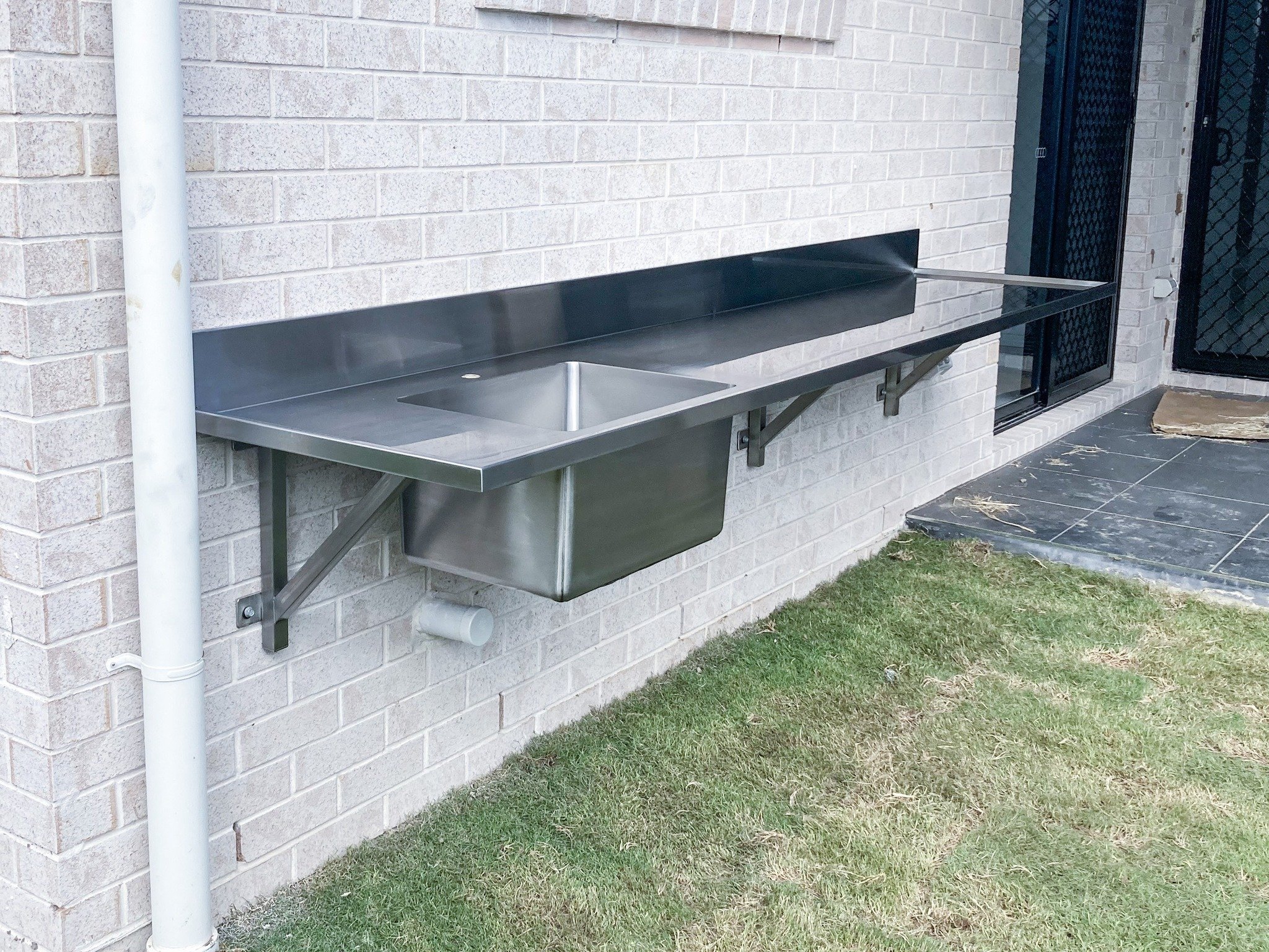 Perfect for the avid fisher - a custom outdoor stainless steel filleting bench.
Designed with durability, easy cleaning, and hygiene in mind.. each bench is custom built to your specifications to fit your space perfectly.