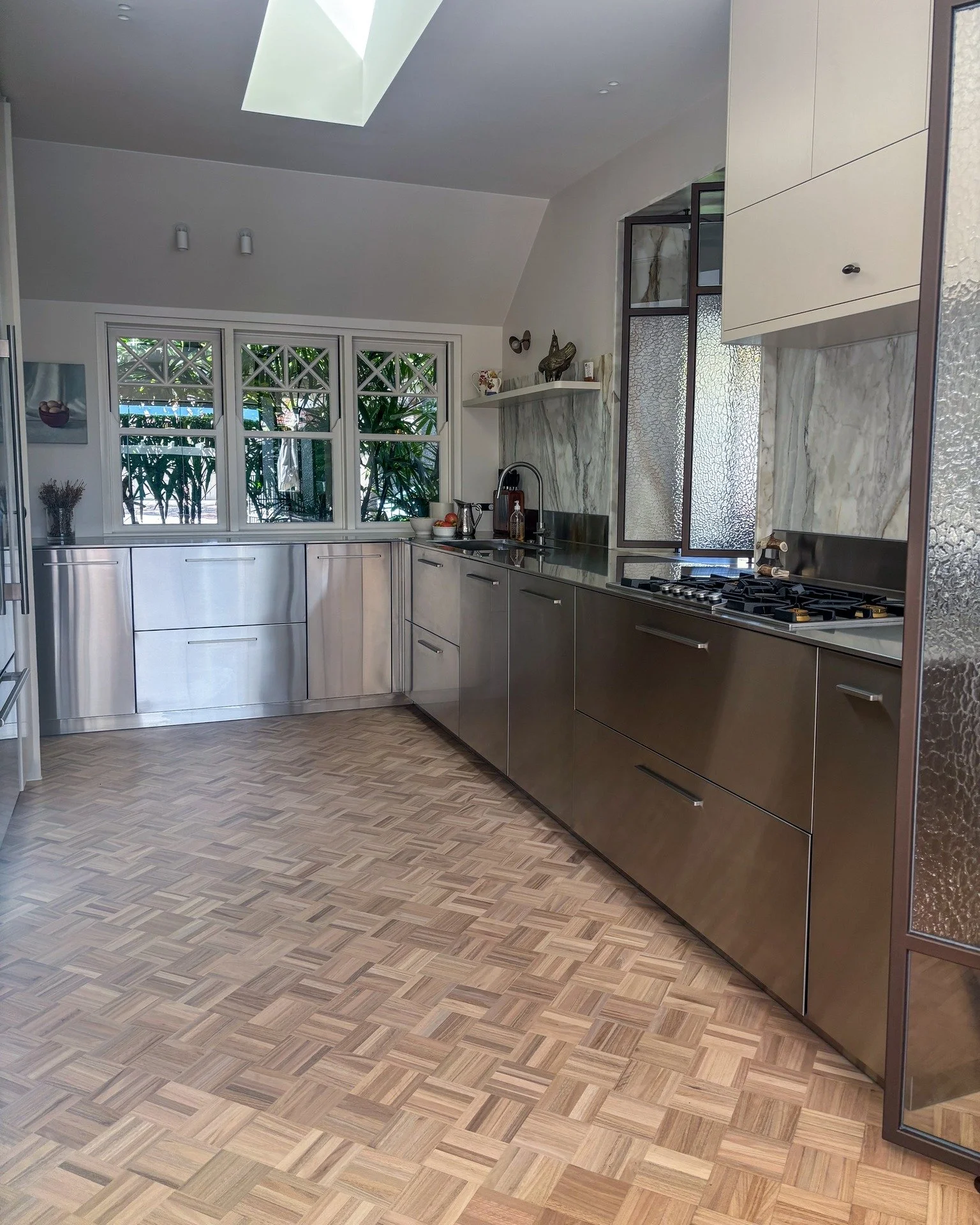 Not just benchtops. A complete stainless steel kitchen.