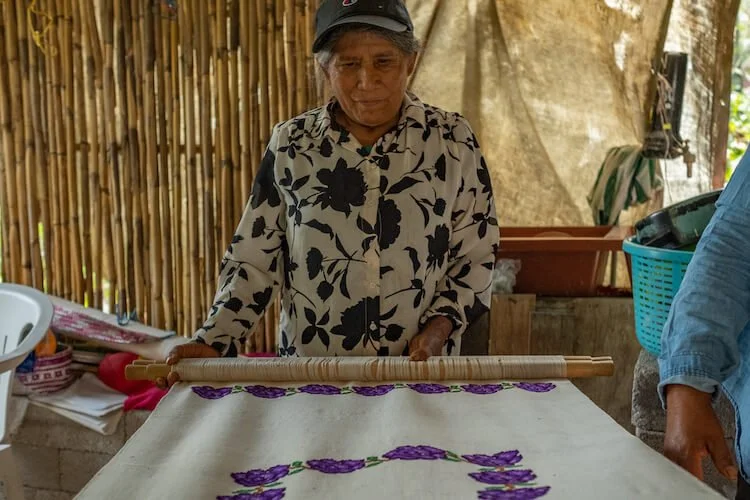 Herminia, a master in craftmanship, with her recent work.