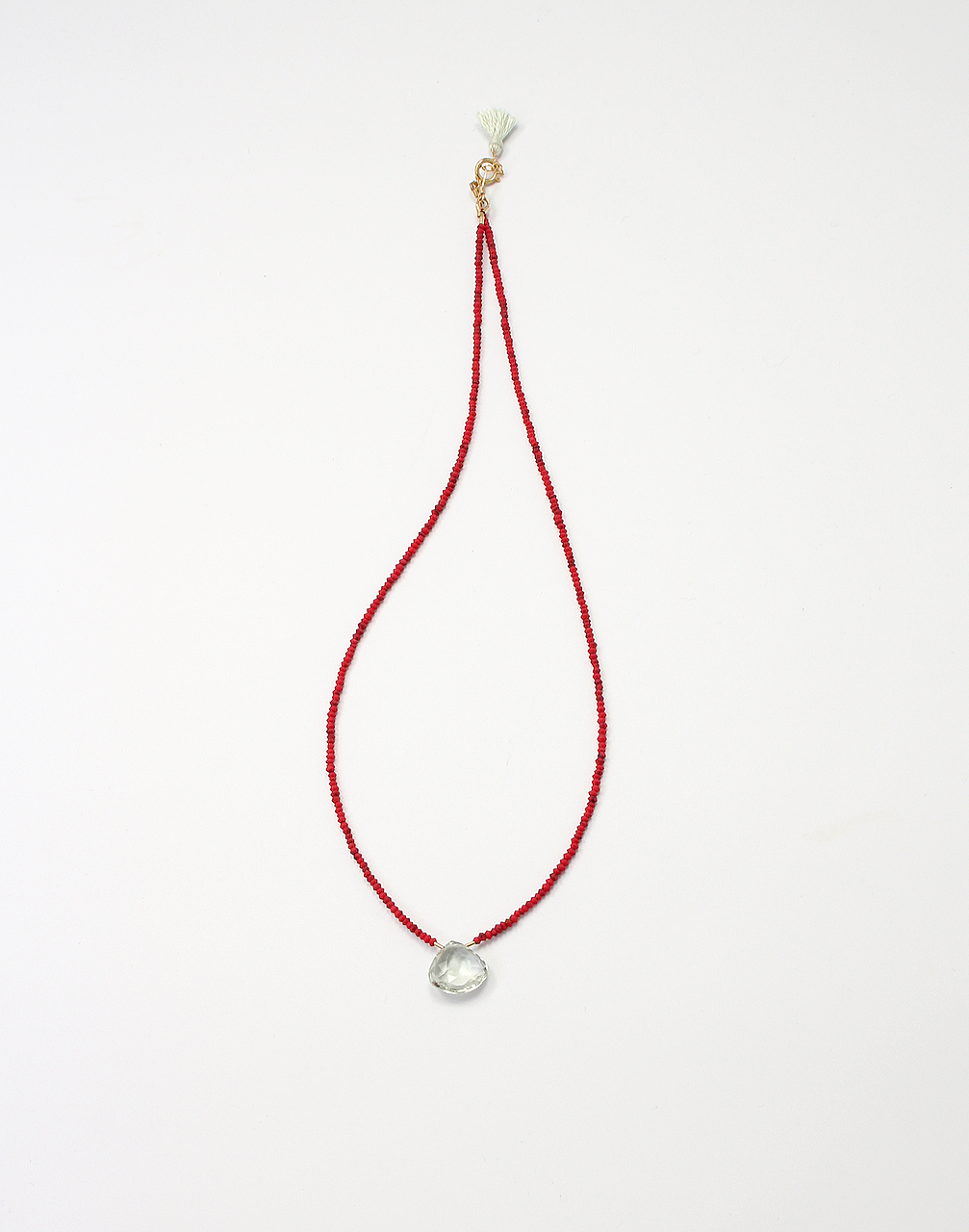 Handmade necklace with green amethyst briolette on red coral beads, gold filled clasp, and green silk tassel
