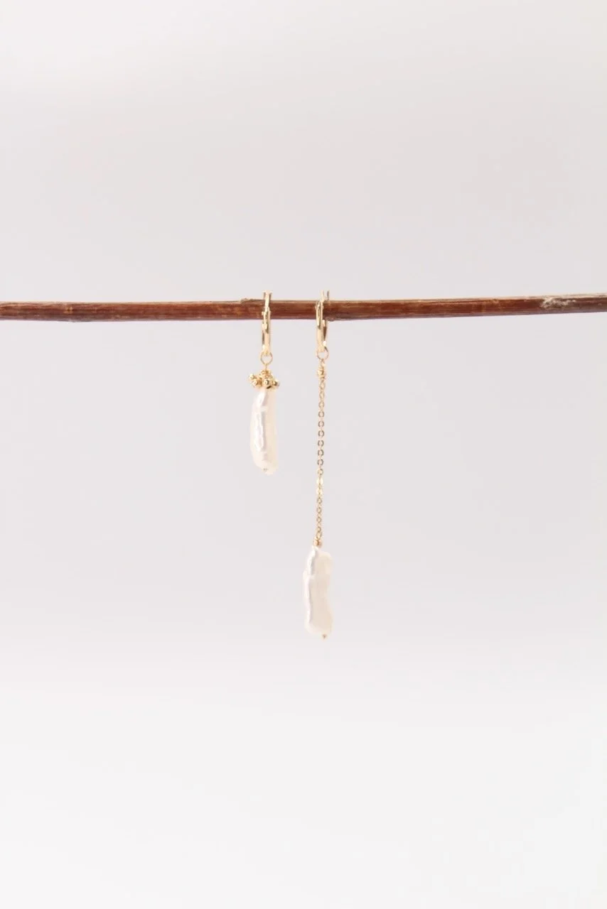 Mismatched biwa pearl earrings on 10k solid gold hoops, one with gold filled chain, the other with bead cluster.