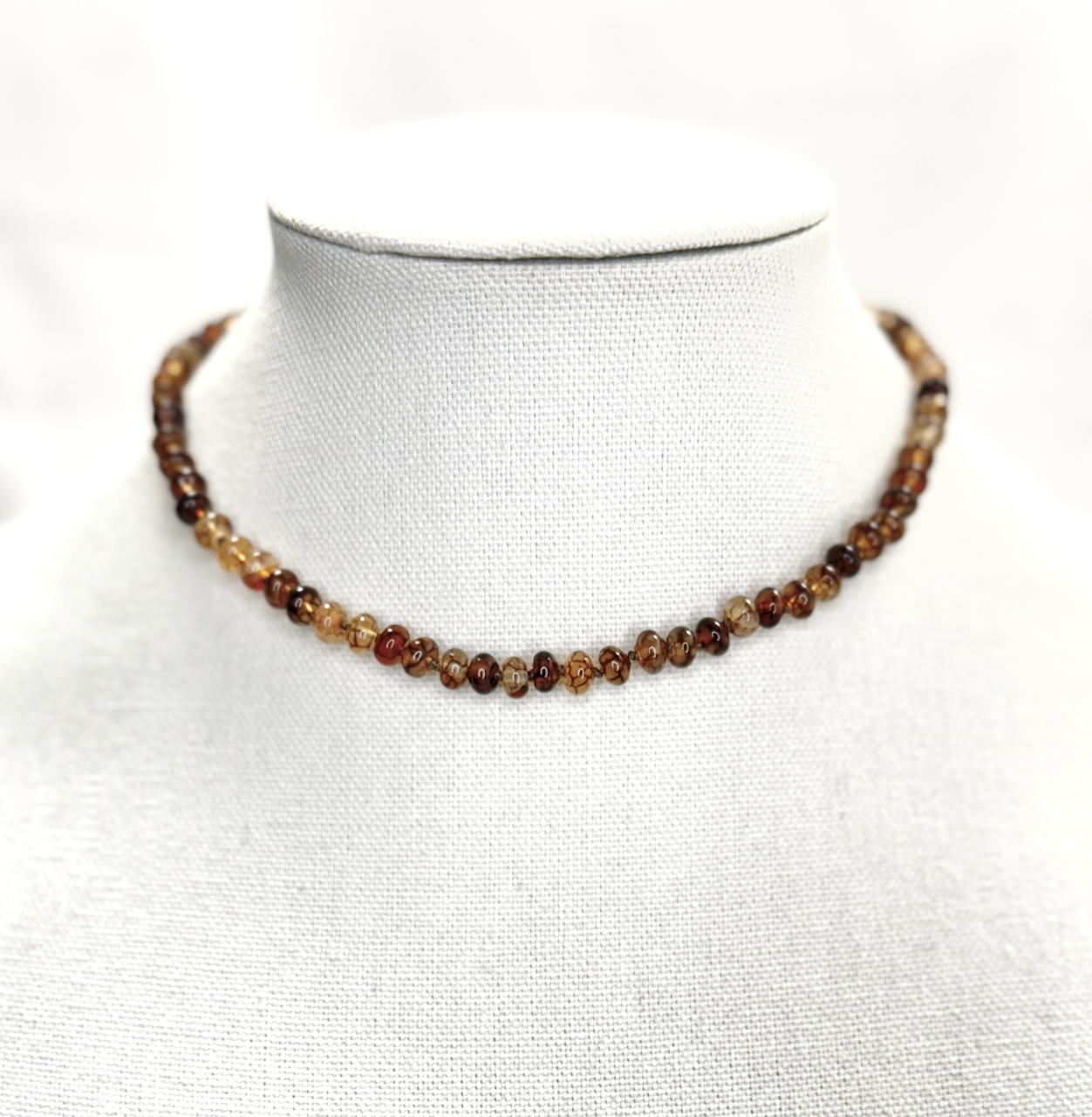 Knotted dendritic agate necklace with champagne citrine, gold clasp, and gold silk tassel