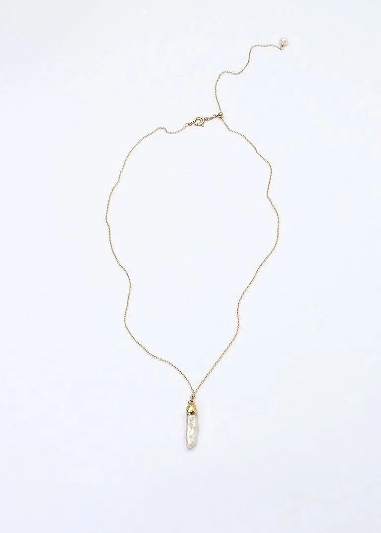 Biwa pearl pendant in vermeil setting with freshwater pearl accents on a gold filled chain and adjustable sliding clasp.