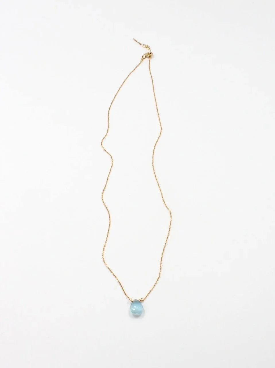 aquamarine gemstone necklace on a delicate gold-filled chain with clasp, minimalist jewelry design