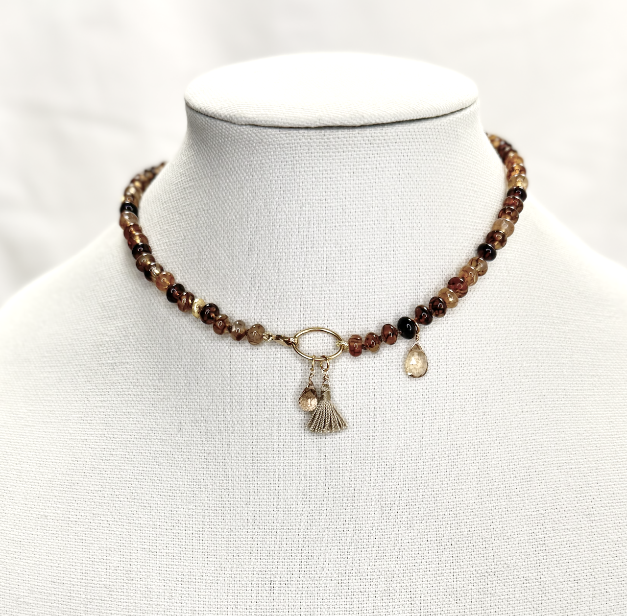Knotted dendritic agate necklace with champagne citrine, gold clasp, and gold silk tassel