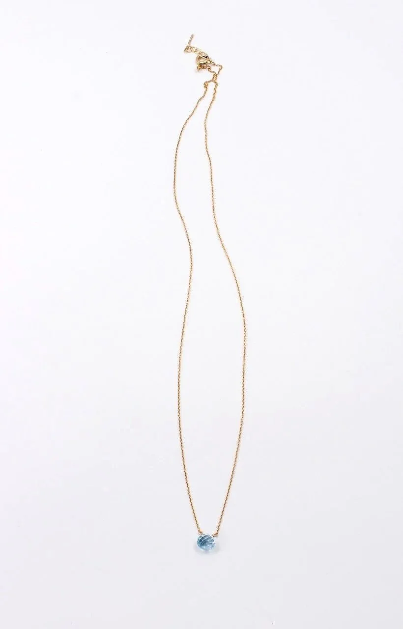 blue topaz gemstone necklace on a delicate gold-filled chain with clasp, minimalist jewelry design