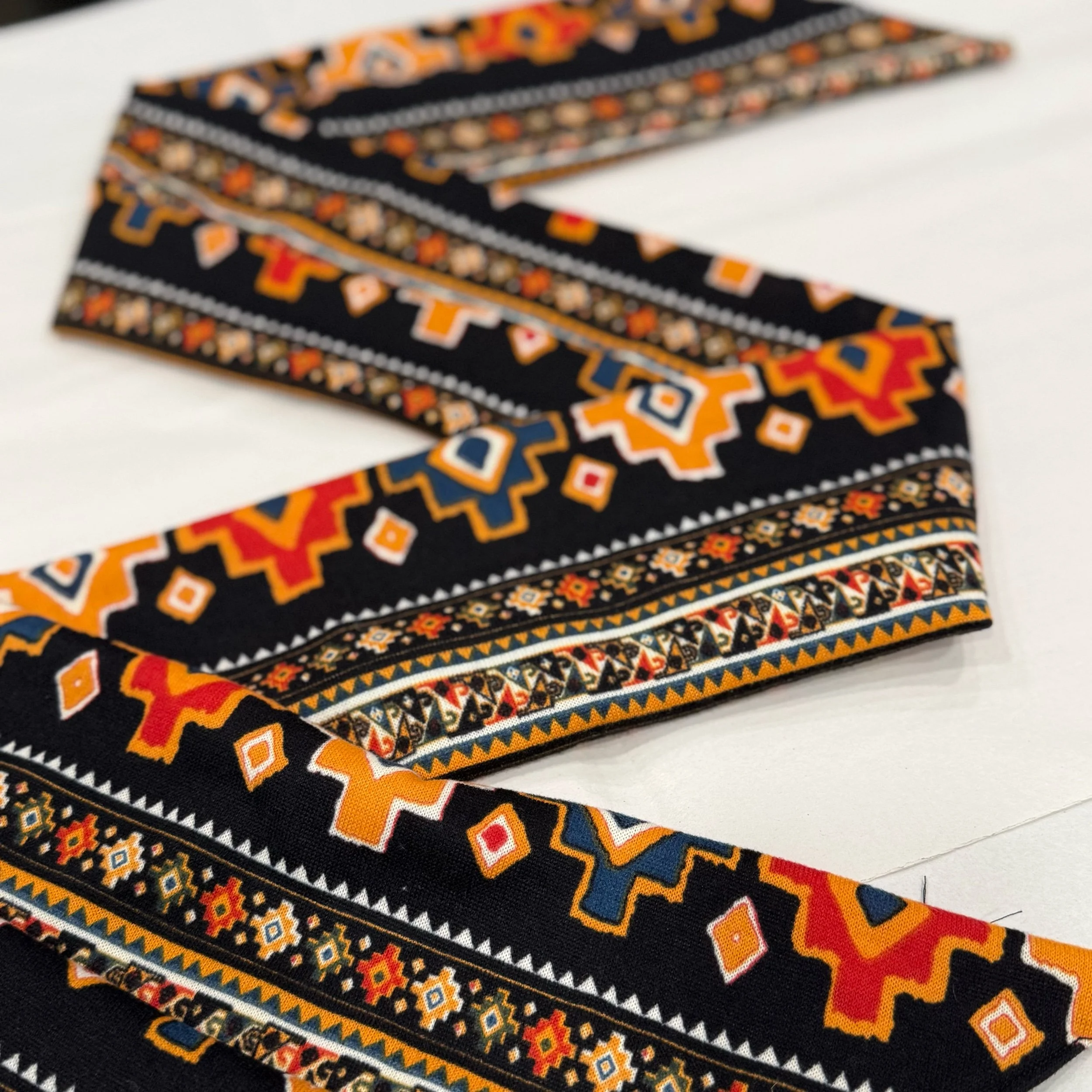 A western pattern black and orange turban