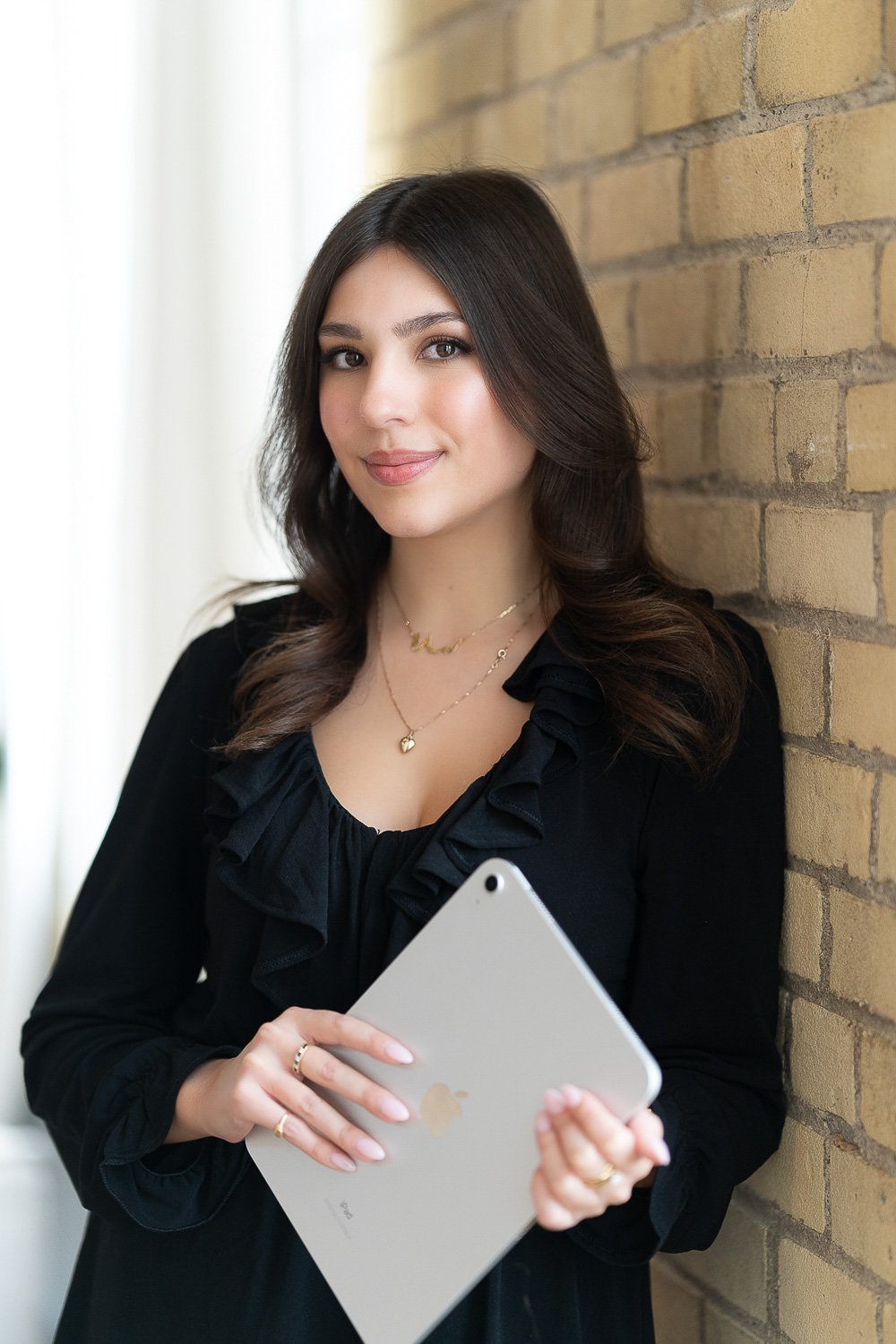 Business portrait with a softly blurred office background