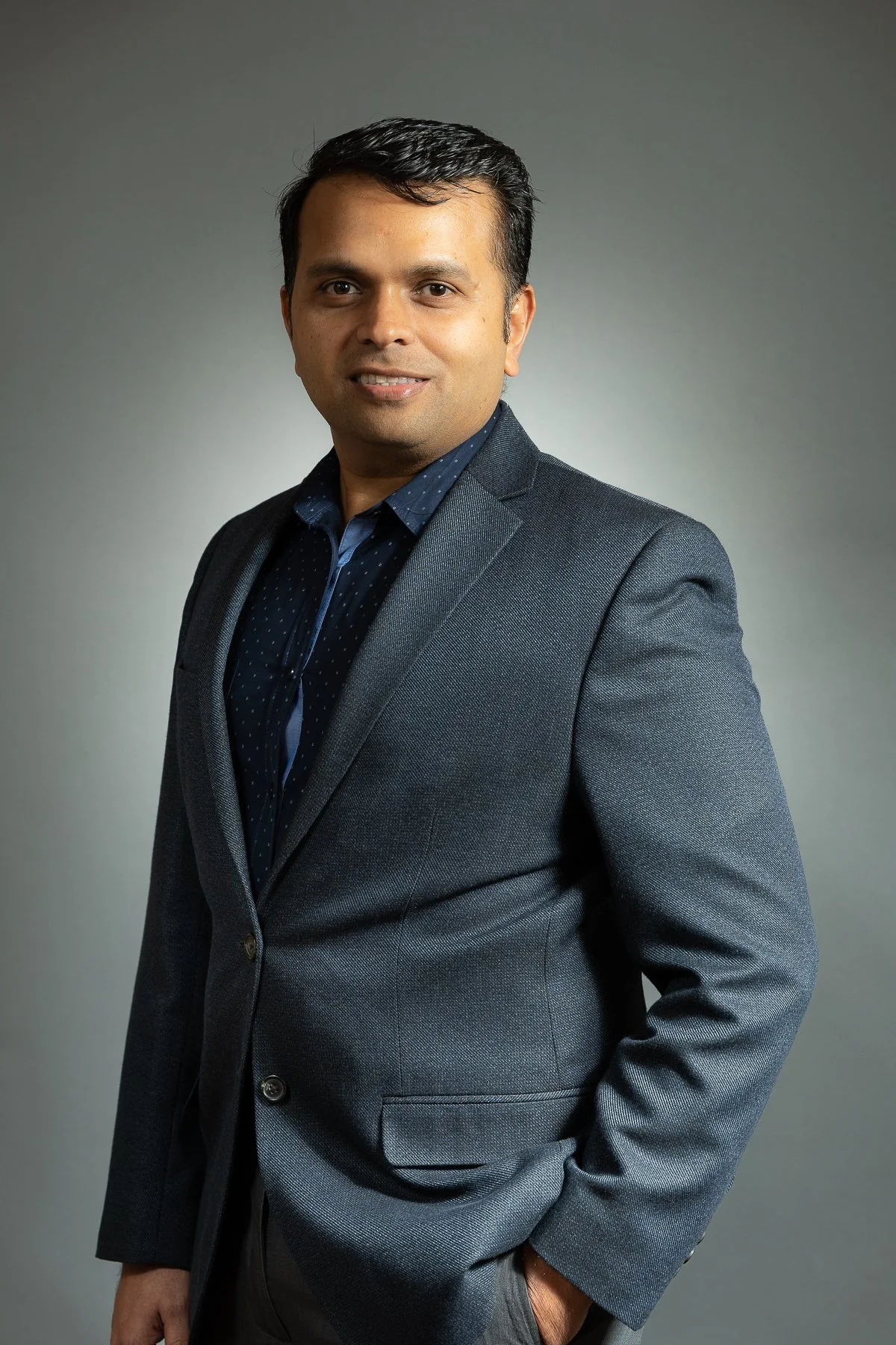 On-location portrait studio with professional lighting and backdrop