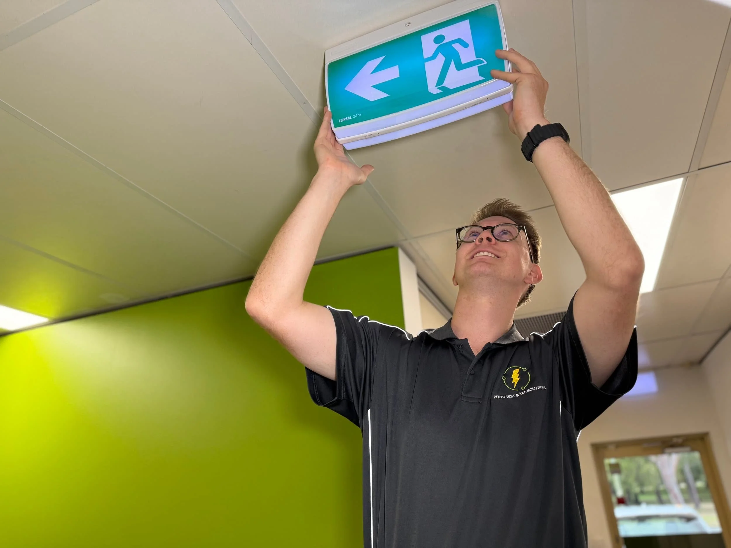 Emergency & Exit Light EEL Testing by PTTS Technician
