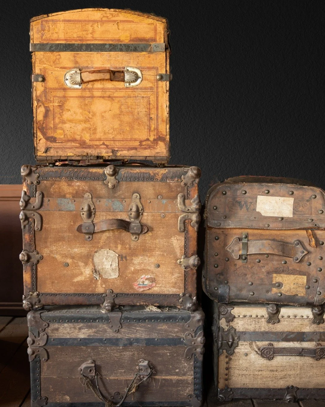Two men. One cart. And three trunks.

A dead master's studio dismantled around them, a city sliding toward war, and everything they own reduced to what will fit in three trunks. They have just survived something they had no right to. And here is the 