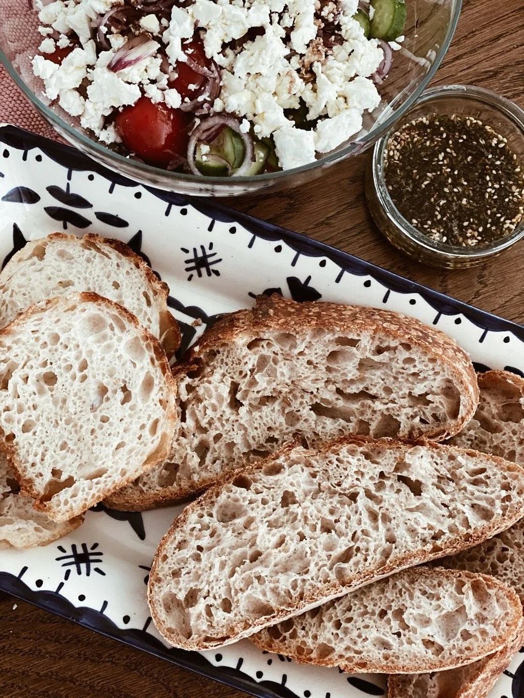 You’ve mostly seen Freja in the middle of mixing, shaping, baking. But here she is, minutes before being devoured, on a plate with focaccia slices with a fresh salad and a bowl of za’atar with olive oil. 
That’s all you need for a