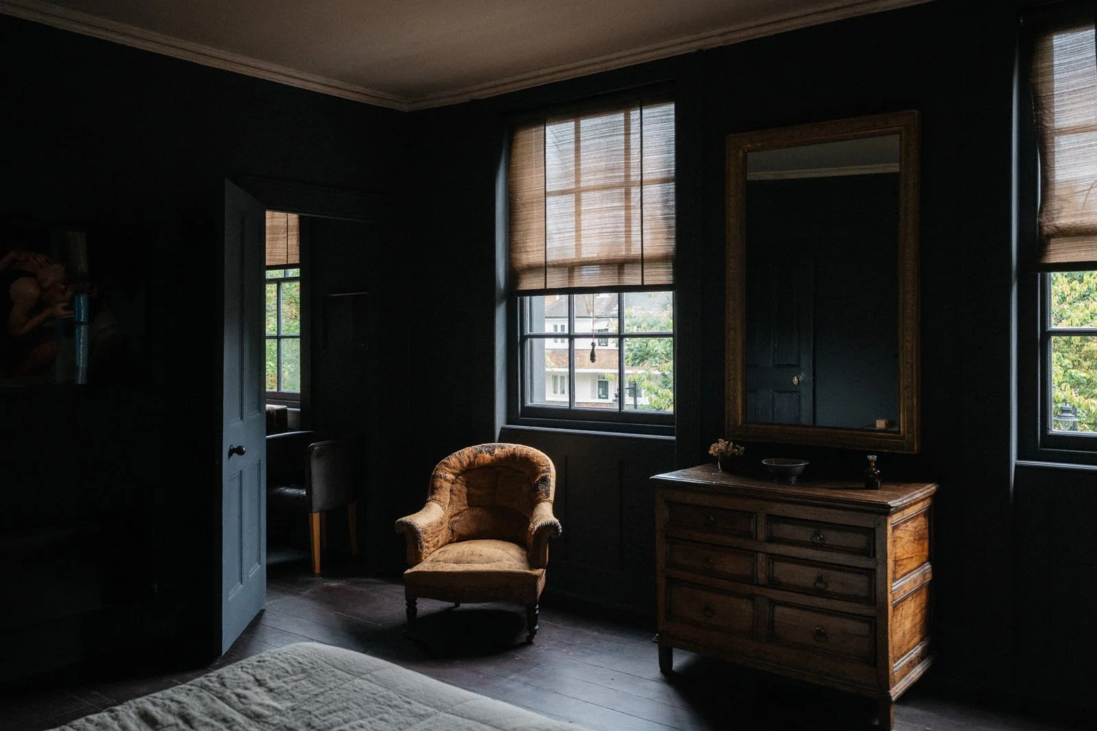 Bedroom of Nigel Slater painted in Night, our deep near-black blue paint colour.