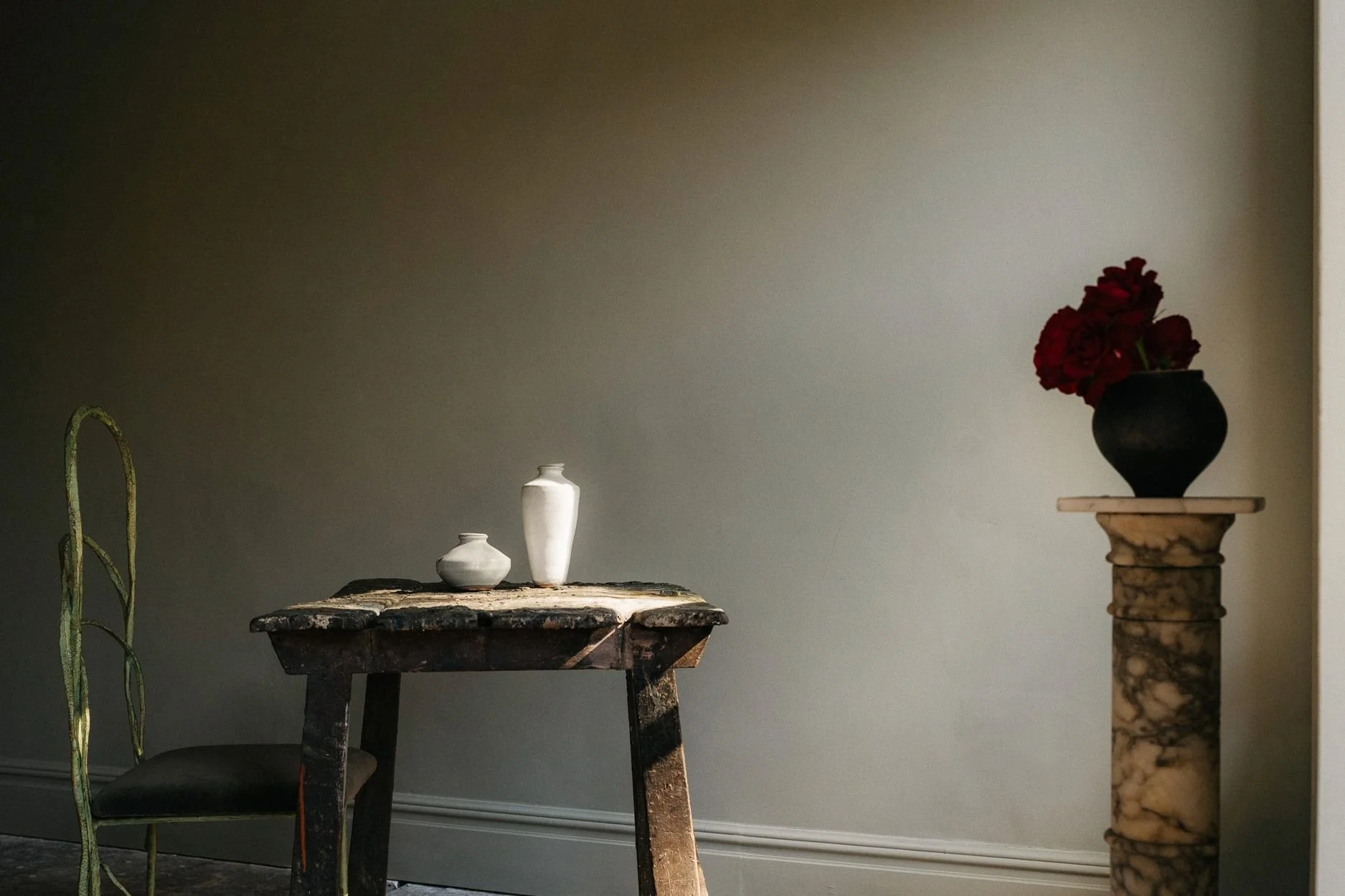 Room painted in The River Runs (muted green).