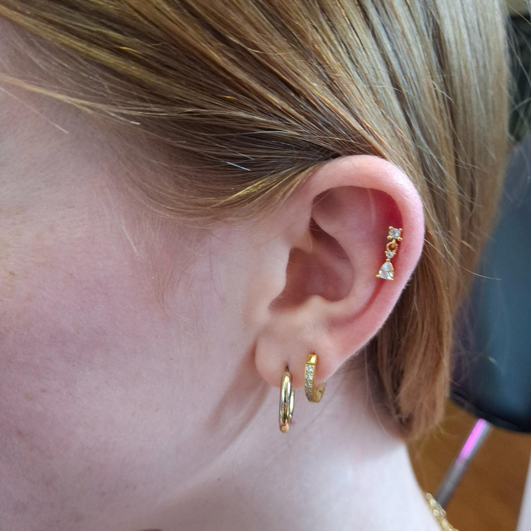 Piercings with Genevieve Piercings professional piercer qualified piercer curated ear specialist ear piercings nostril piercings nipple piercings jewellery styling discoballxgenevieve piercing jewellery piercing party group booking children and teen