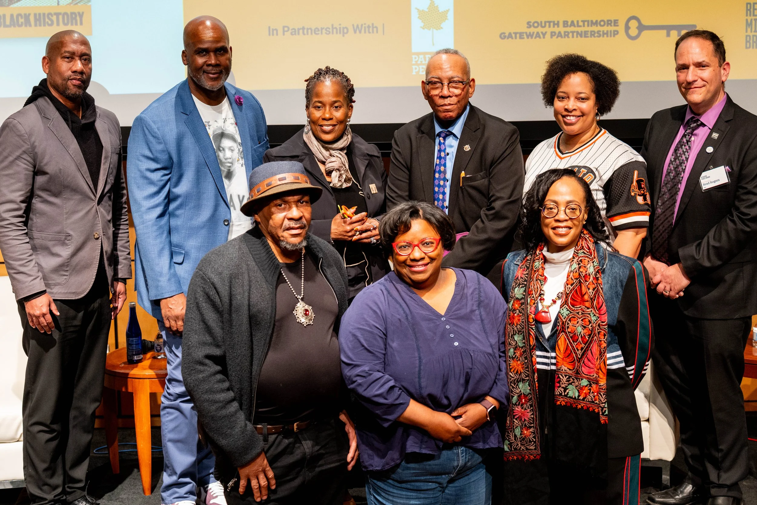  Panelists are joined by SBGP Board members, staff and community members for a group picture following the panel event. 