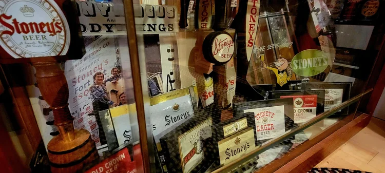 Display of Stoney's coasters, labels, and small advertising pieces