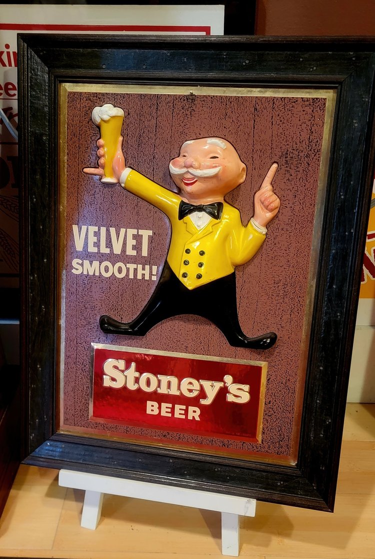 Framed Velvet Smooth Mr. Smoothie Stoney's sign on an easel
