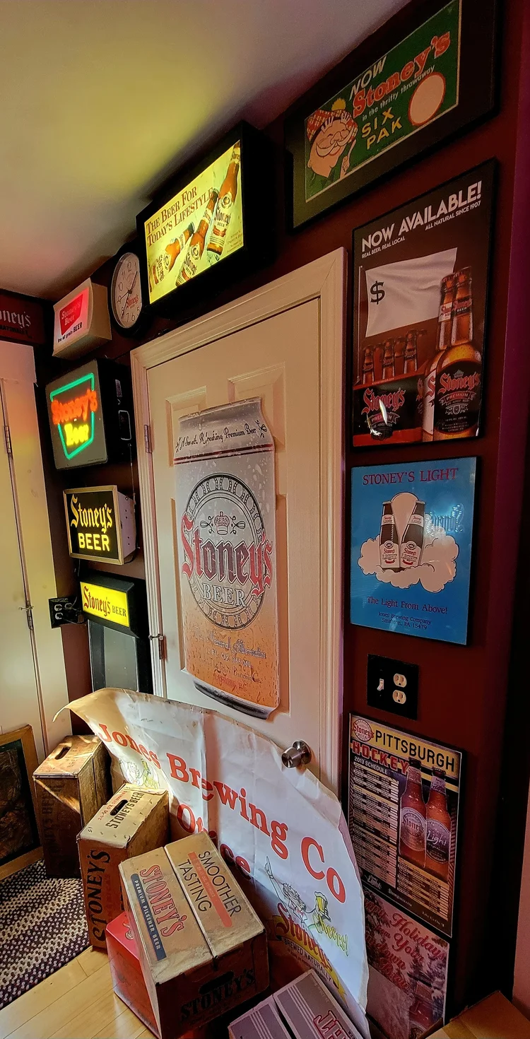 Doorway framed by Stoney's signs and a lit display
