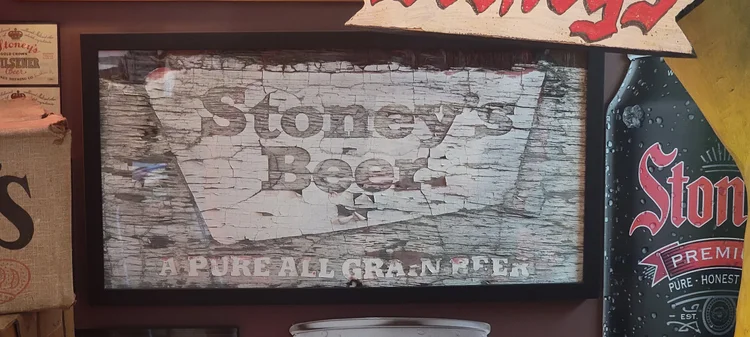 Weathered wooden Stoney's Beer A Pure All Grain Beer sign