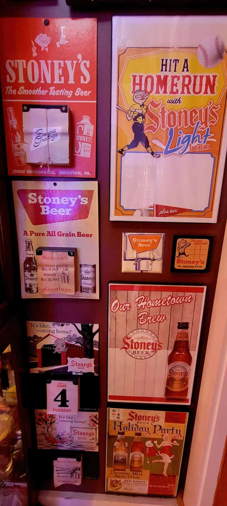 Column display of Stoney's Home Run and bottle signs