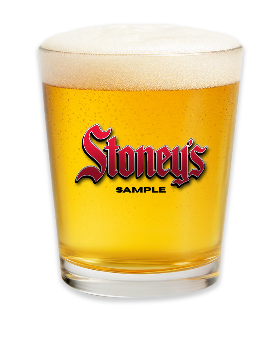 Stoney’s Beer sample glass filled with golden beer and foamy head, used for Stoney’s Beer tasting events and samplings in Pittsburgh and Western Pennsylvania.