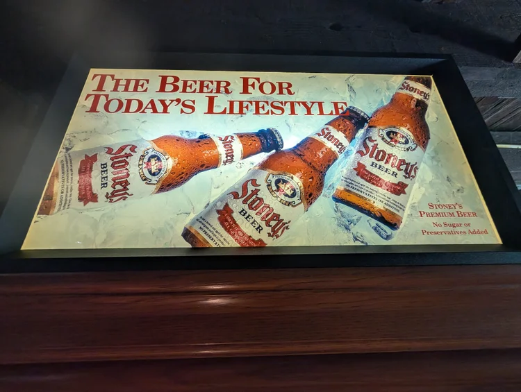 Framed The Beer For Today's Lifestyle Stoney's bottles advertising sign
