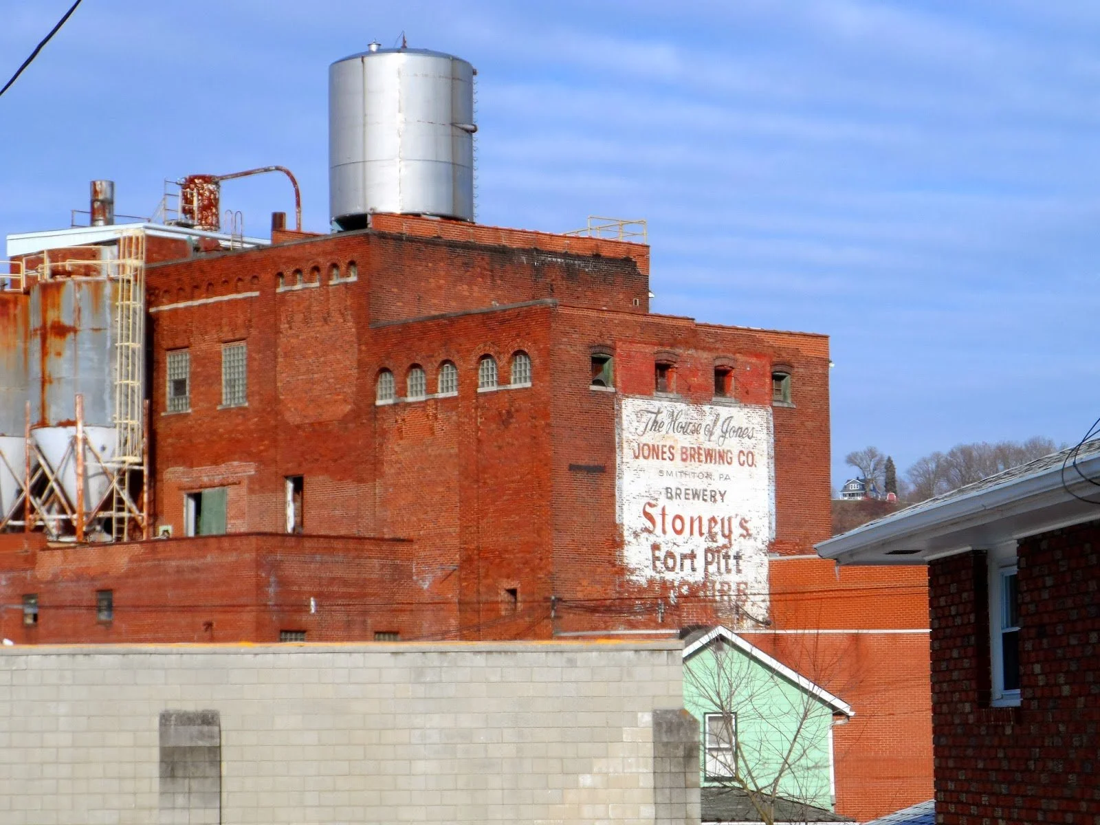 The original Jones Brewing Company building in Smithton, Pennsylvania, featuring the historic hand-painted Stoney's Beer sign on the brick exterior, home of Stoney's Beer since 1907