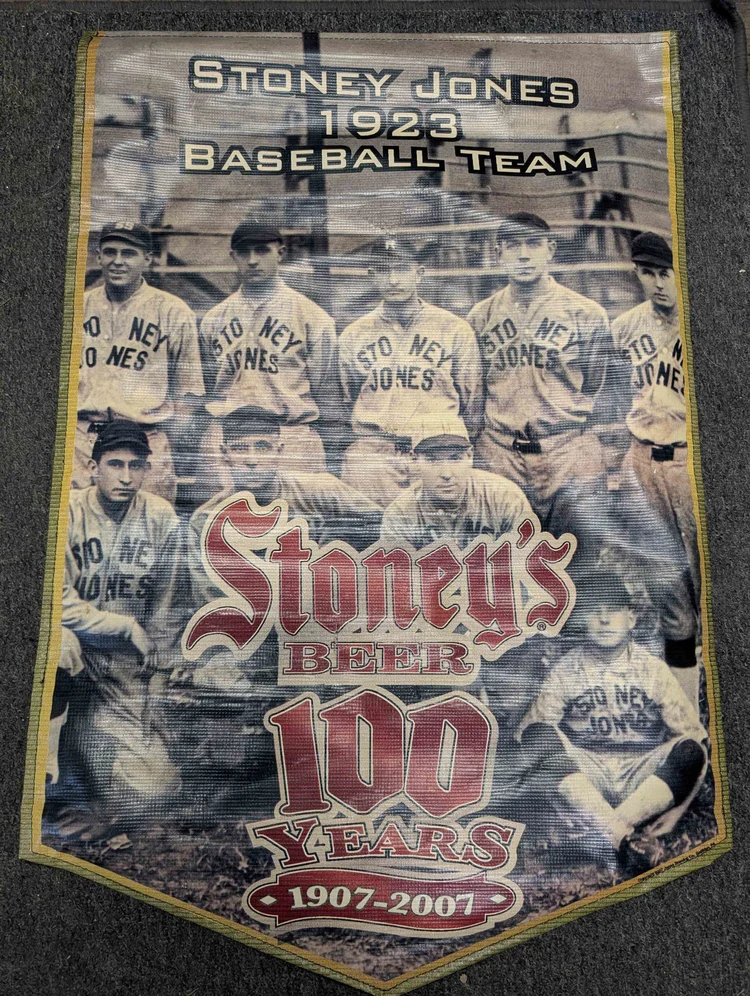 Stoney Jones baseball team and Stoney's Beer 100 Years 1907 to 2007 banner